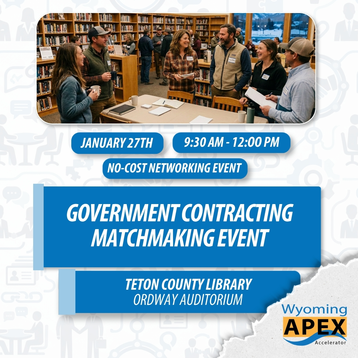 networking event with people talking in a group in a library